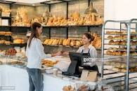 Being Served In a Bakers Shop