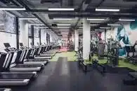 Running machines in a health club.