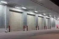 Industrial roller shutters on bays.