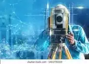 A surveyor looking through an instrument to survey and value land.