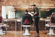 Man having his hair cut at a gents hairdressing salon.
