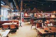 Tables & chairs in a restaurant.
