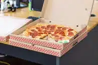 Apizza in a box ready to be delivered.