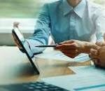 Meeting with a consultant going through ideas