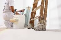 Painter & decorator getting ready to start the painting job.