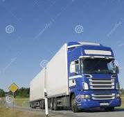 A Haulage truck on the road  to deliver goods via their haulage company.