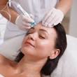 Person having hydrafacial treatment