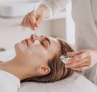 Person laying down having a skin peel treatment.