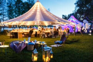 Colourful wedding tents at night. Wedding day.