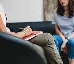 A person having counselling by a counsellor