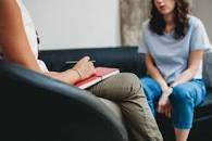 A person having counselling by a counsellor
