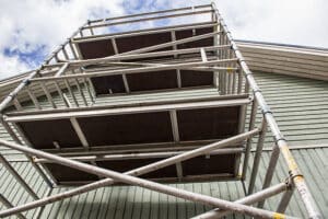 The scaffolding was used to paint the house safely.